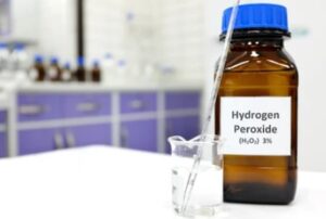 Hydrogen peroxide for cleaning a mattress without a vacuum