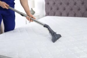 Vacuuming the mattress to Remove Dust Mites